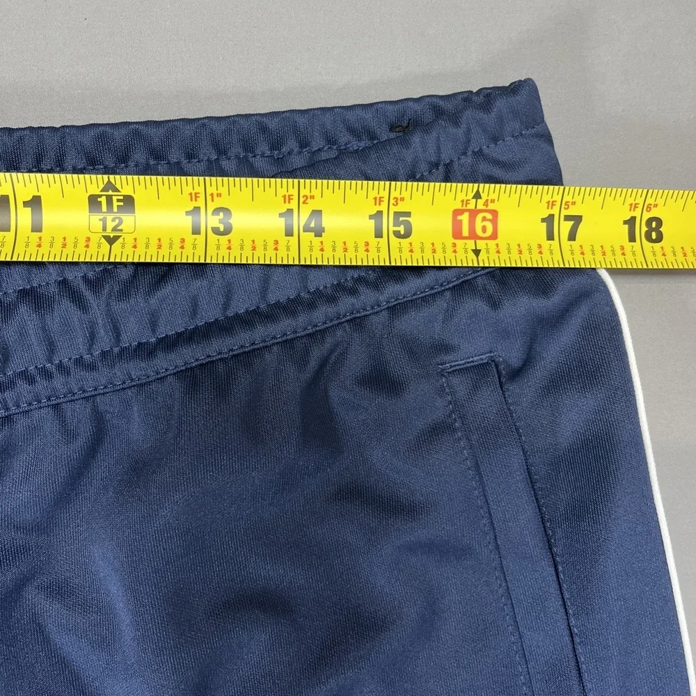 ⁠Nike Sportswear Men's Large Blue Straight Leg Ankle Zip Casual Outdoor Pants⁠